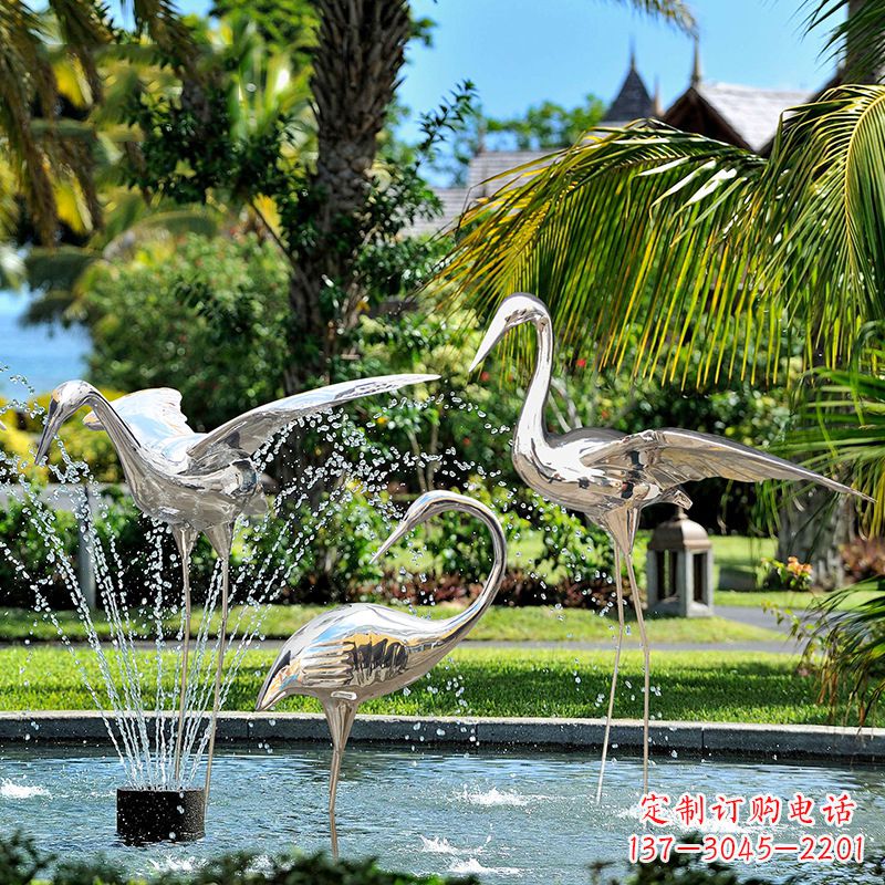 内江仙鹤雕塑-公园池塘不锈钢喷泉中的仙鹤雕塑